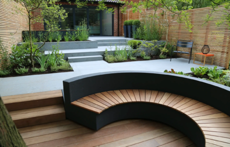 A modern courtyard garden in a dramatic setting.