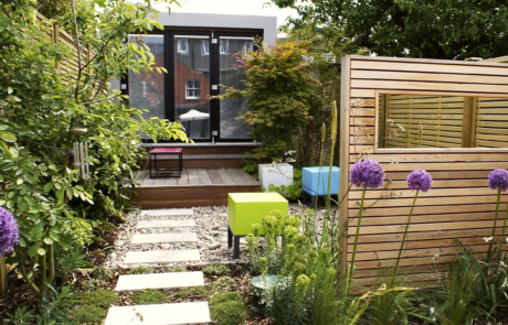 A garden with modern, soft and airy planting with splashes of colour.