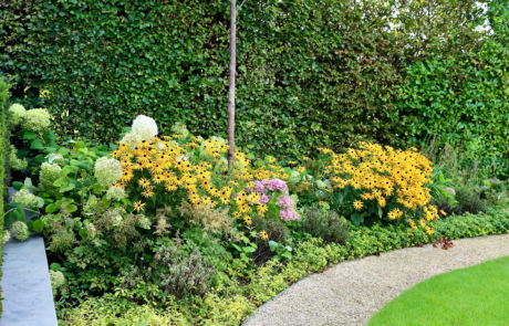 An elevated garden in Hertfordshire with expansive views to a borrowed landscape.