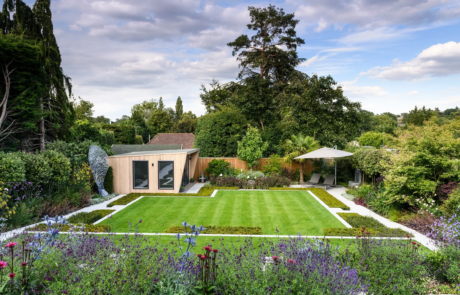 A garden that exudes classical formality, softened by romantic, billowy planting