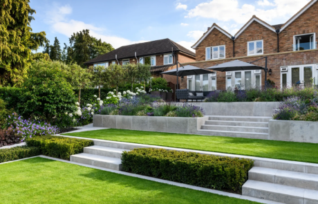 A garden that exudes classical formality, softened by romantic, billowy planting