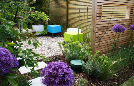 A garden with modern, soft and airy planting with splashes of colour.