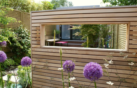 A garden with modern, soft and airy planting with splashes of colour.