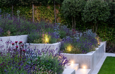 A garden that exudes classical formality, softened by romantic, billowy planting